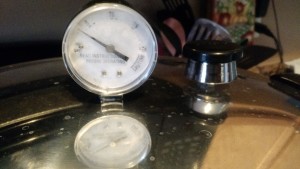 Pressure canner is coming to pressure.  The weight is the black thing on the right.